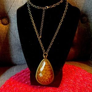 Long antiqued brass tone and faux gem’d tortoise shell necklace